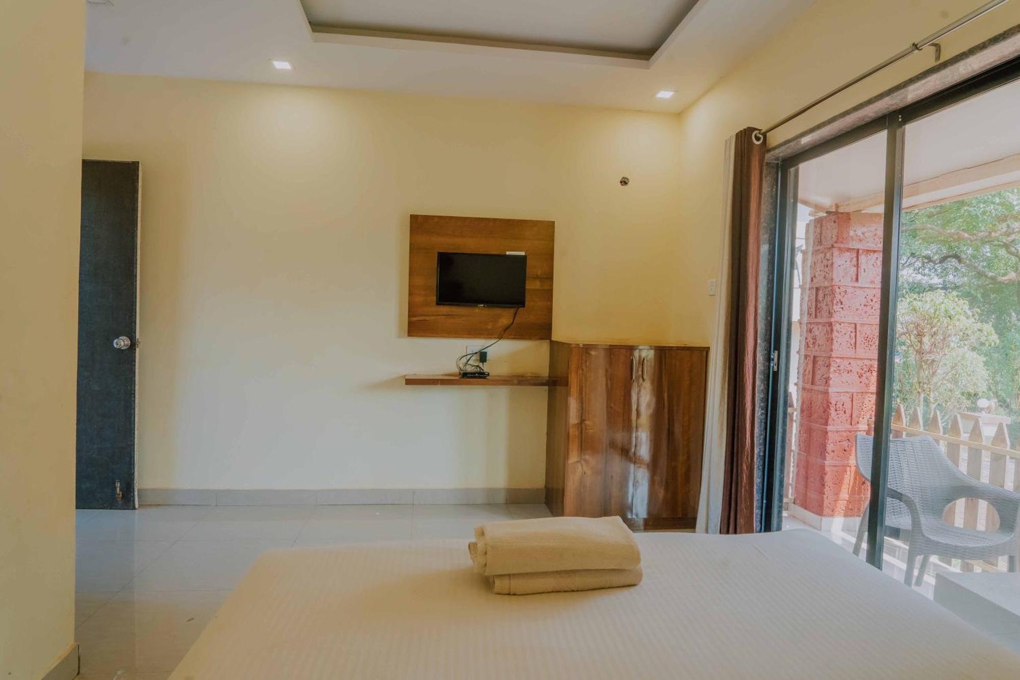 Hotel Oakwood มหาบาเลชวาร์ ห้อง รูปภาพ
